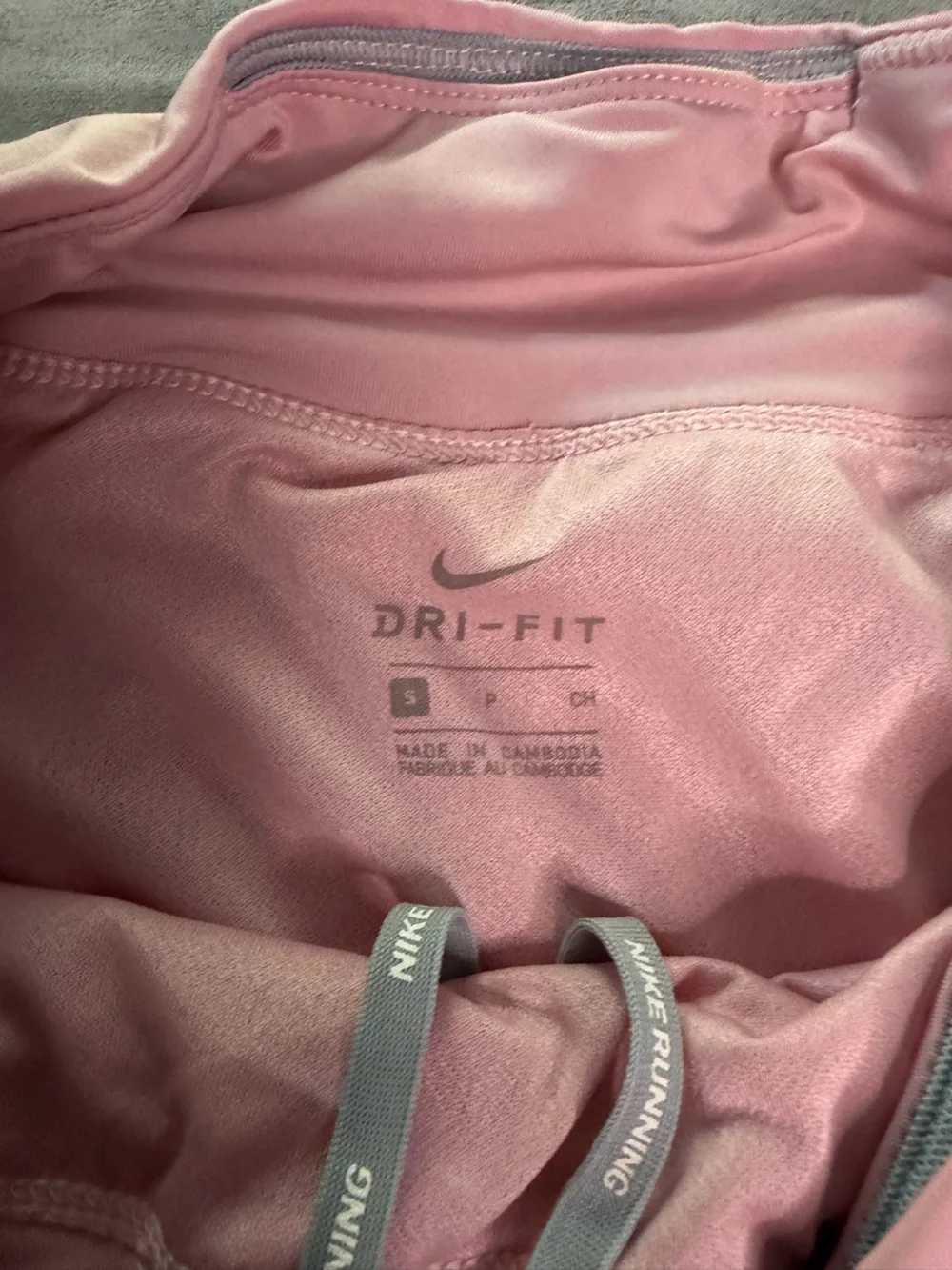 Nike Women's Light Pink Running Shorts with Reflective Swoosh